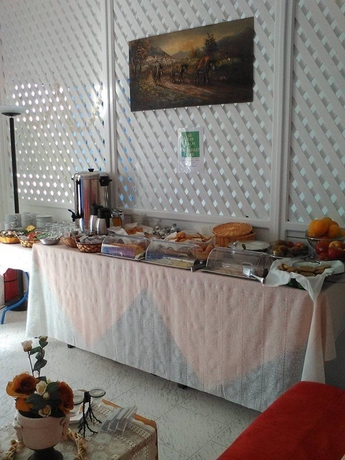 Imagen del bar/restaurante del Hotel Blue Island perissa. Foto 4