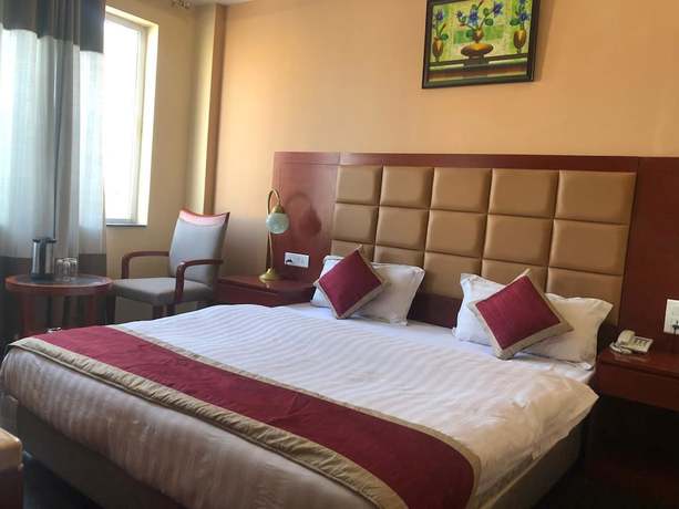 Imagen de la habitación del Hotel Blue Lagoon, Haridwar. Foto 10