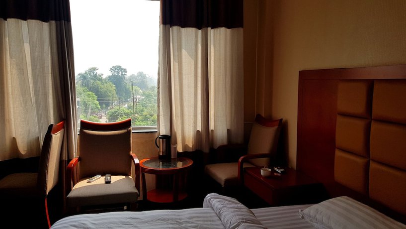 Imagen de la habitación del Hotel Blue Lagoon, Haridwar. Foto 11