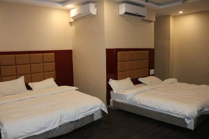 Imagen de la habitación del Hotel Blue Lagoon, Haridwar. Foto 13