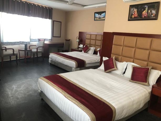 Imagen de la habitación del Hotel Blue Lagoon, Haridwar. Foto 15