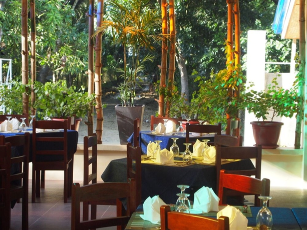 Imagen del bar/restaurante del Hotel Blue Lagoon Inn and Suites. Foto 2