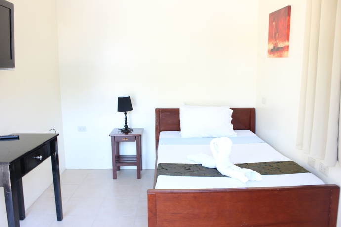 Imagen de la habitación del Hotel Blue Lagoon Inn and Suites. Foto 4