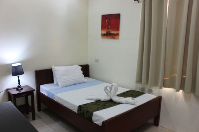 Imagen de la habitación del Hotel Blue Lagoon Inn and Suites. Foto 5