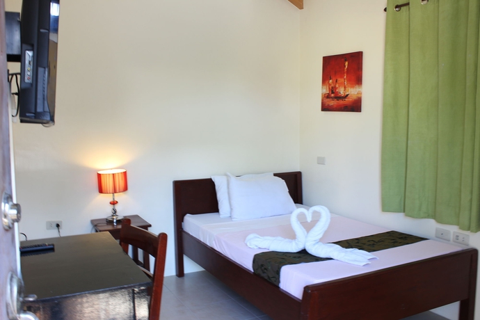 Imagen de la habitación del Hotel Blue Lagoon Inn and Suites. Foto 6