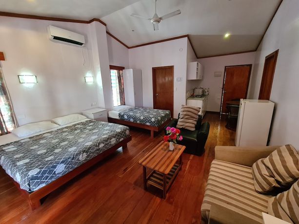 Imagen de la habitación del Hotel Blue Light Village hotel. Foto 8