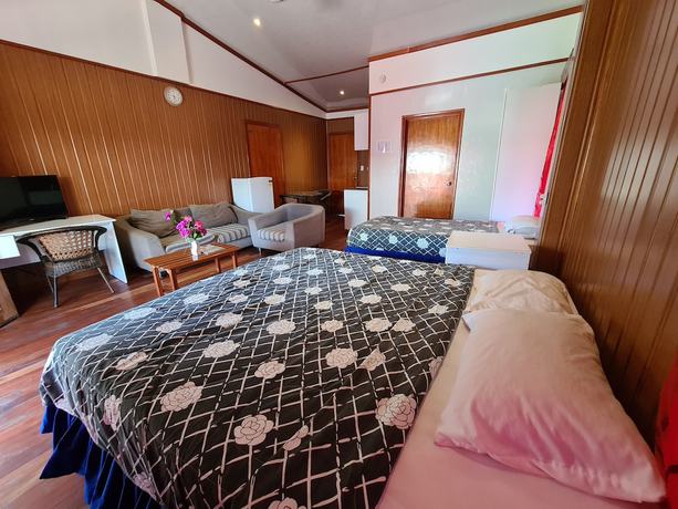 Imagen de la habitación del Hotel Blue Light Village hotel. Foto 14