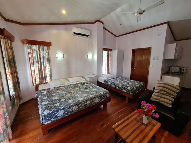 Imagen de la habitación del Hotel Blue Light Village hotel. Foto 16