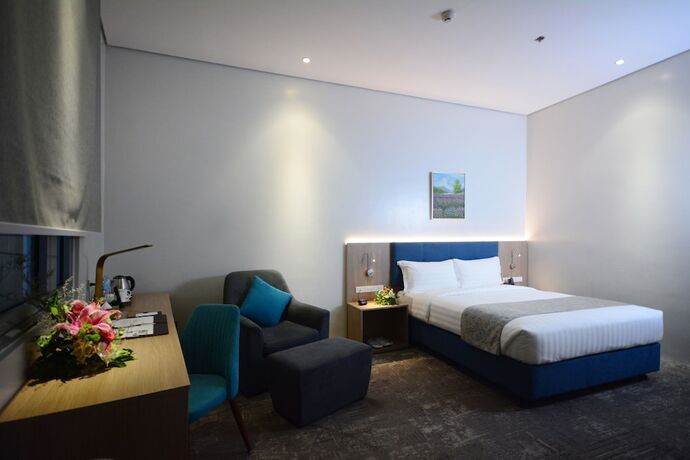 Imagen de la habitación del Hotel Blue Lotus Davao. Foto 12