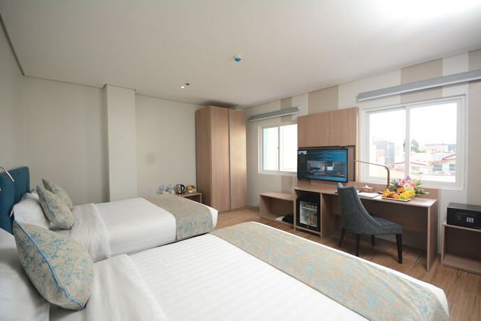 Imagen de la habitación del Hotel Blue Lotus Davao. Foto 17