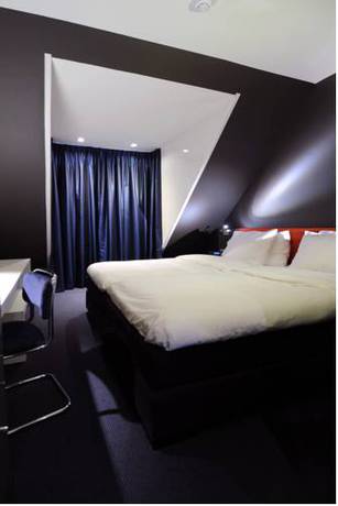 Imagen de la habitación del Hotel Blue Mansion. Foto 6