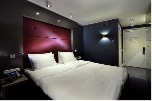 Imagen de la habitación del Hotel Blue Mansion. Foto 8