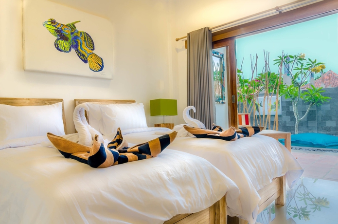 Imagen de la habitación del Hotel Blue Marlin Trawangan. Foto 15