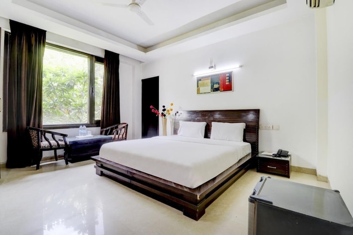 Imagen de la habitación del Hotel Blue Moon Residency and Restaurant. Foto 10