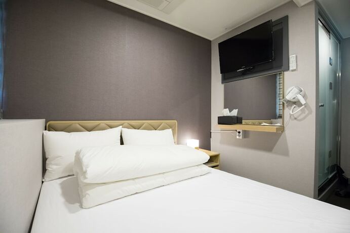 Imagen de la habitación del Hotel Blue Mountain Myeongdong. Foto 17