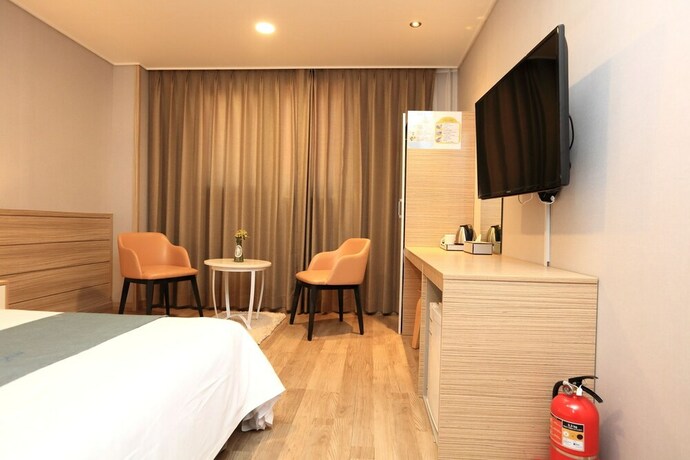 Imagen de la habitación del Hotel Blue Mountain, Seongsan-eup. Foto 17