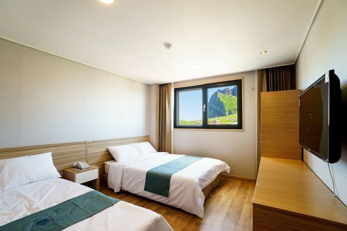 Imagen de la habitación del Hotel Blue Mountain, Seongsan-eup. Foto 20