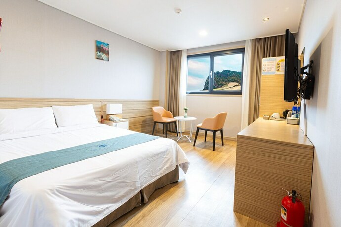 Imagen de la habitación del Hotel Blue Mountain, Seongsan-eup. Foto 22