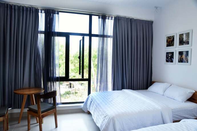 Imagen de la habitación del Hotel Blue Ocean Homestay. Foto 18
