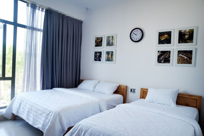 Imagen de la habitación del Hotel Blue Ocean Homestay. Foto 24