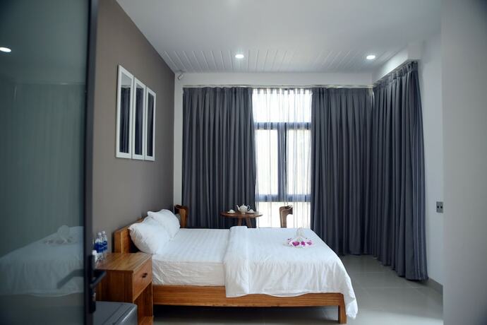 Imagen de la habitación del Hotel Blue Ocean Homestay. Foto 30