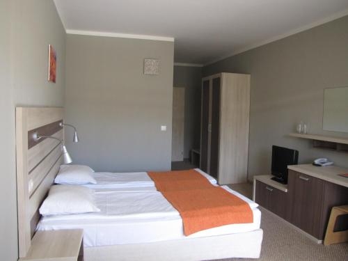 Imagen de la habitación del Hotel Blue Orange Beach Resort. Foto 6