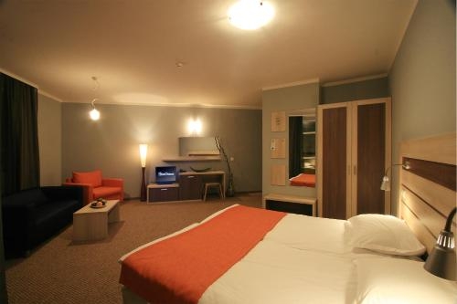 Imagen de la habitación del Hotel Blue Orange Beach Resort. Foto 7