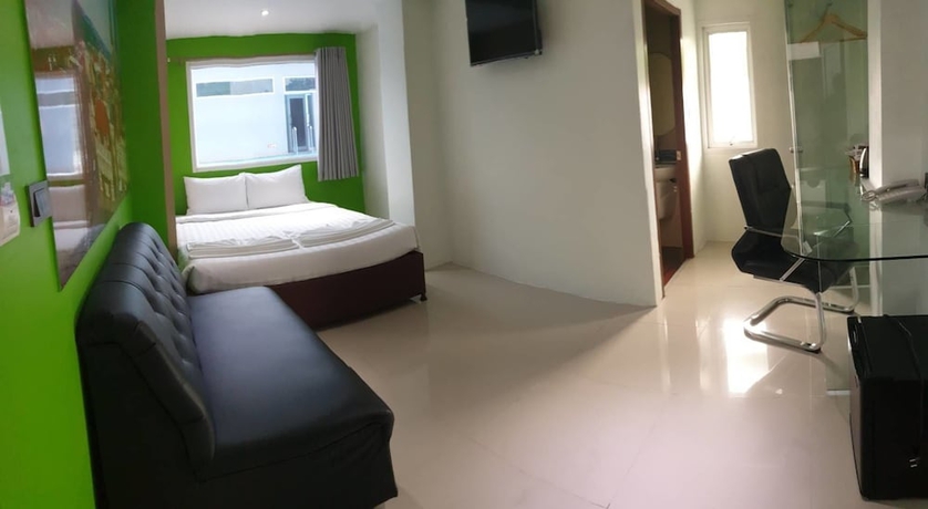 Imagen de la habitación del Hotel Blue Orchids. Foto 7