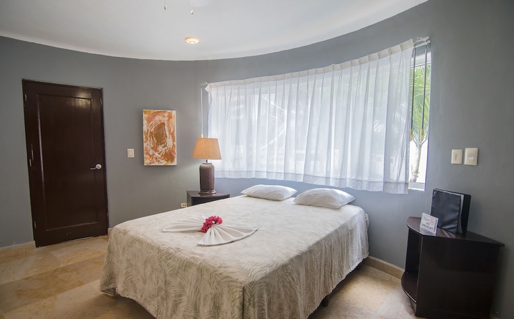Imagen de la habitación del Hotel Blue Palms Condos By Kamuvan. Foto 5