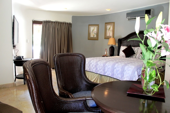 Imagen de la habitación del Hotel Blue Palms Condos By Kamuvan. Foto 13
