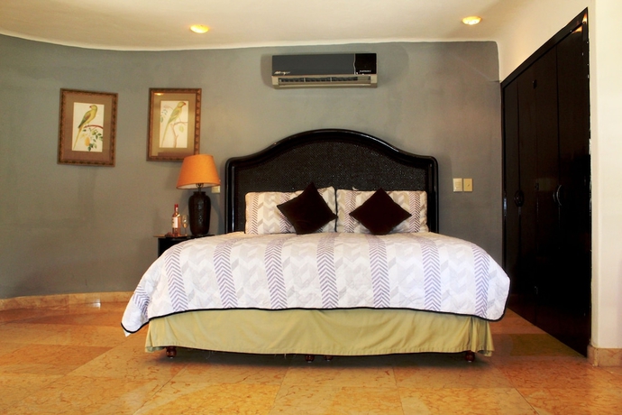 Imagen de la habitación del Hotel Blue Palms Condos By Kamuvan. Foto 14