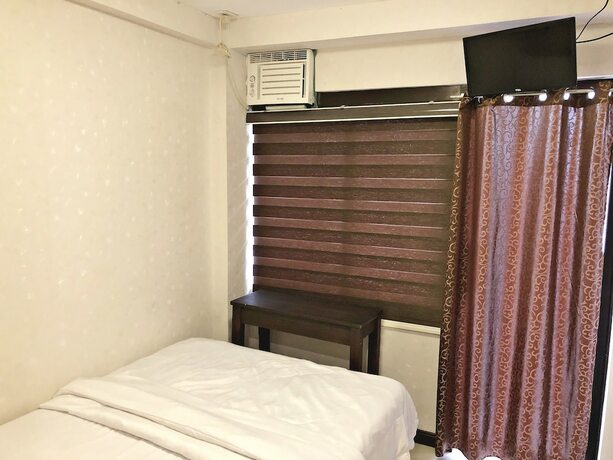 Imagen de la habitación del Hotel Blue Paseo Grande Inn. Foto 22