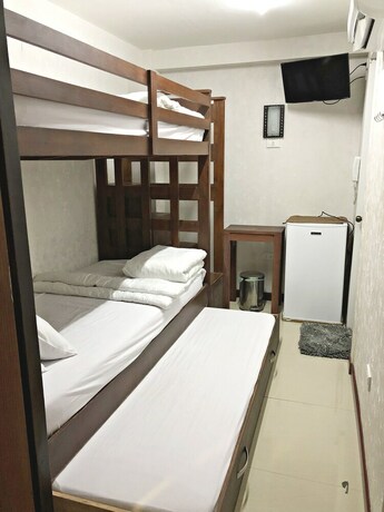 Imagen de la habitación del Hotel Blue Paseo Grande Inn. Foto 25