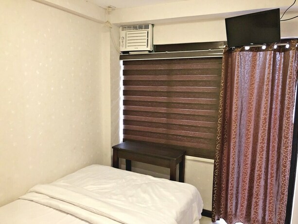 Imagen de la habitación del Hotel Blue Paseo Grande Inn. Foto 33