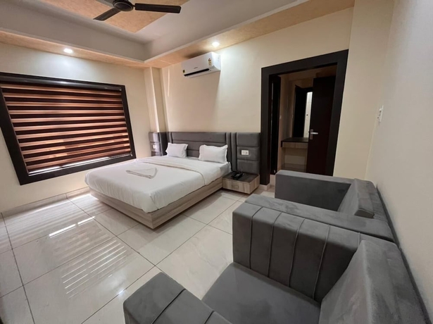 Imagen de la habitación del Hotel Blue Pine, Haridwar. Foto 11