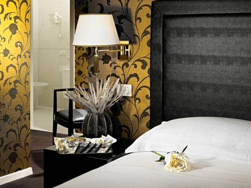 Imagen de la habitación del Hotel Blue Relais Malpensa Lago Maggiore. Foto 14