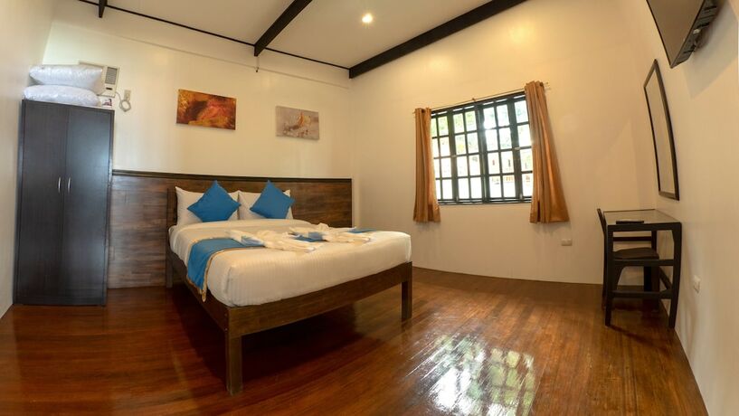 Imagen de la habitación del Hotel Blue Ribbon Dive Resort. Foto 17