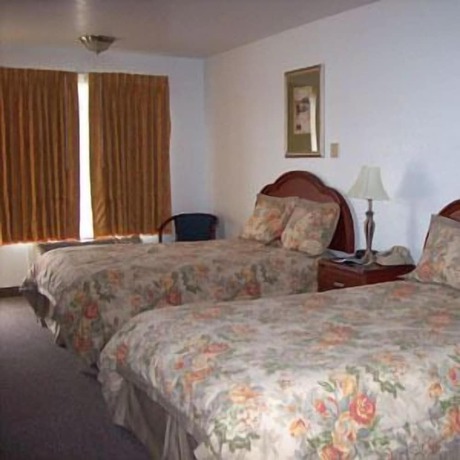 Imagen de la habitación del Hotel Blue Ribbon Inn and Suites. Foto 8