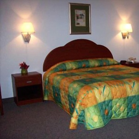 Imagen de la habitación del Hotel Blue Ribbon Inn and Suites. Foto 9