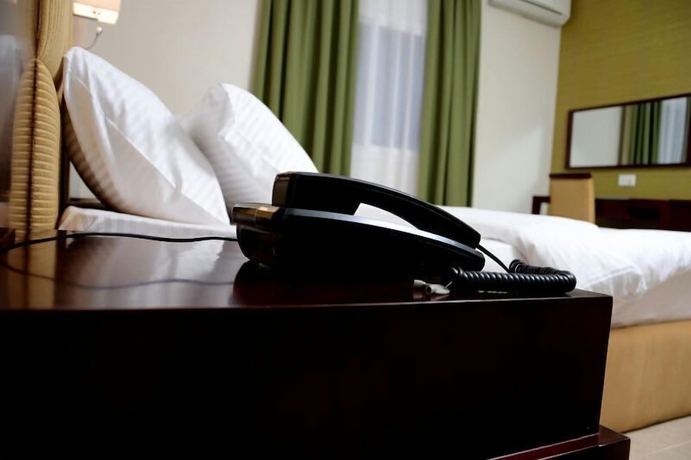 Imagen de la habitación del Hotel Blue Ribbon Suites. Foto 8