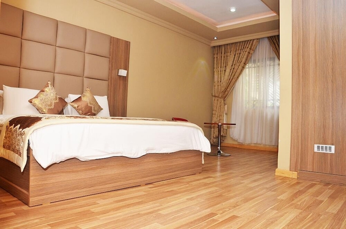 Imagen de la habitación del Hotel Blue Ribbon Suites. Foto 9