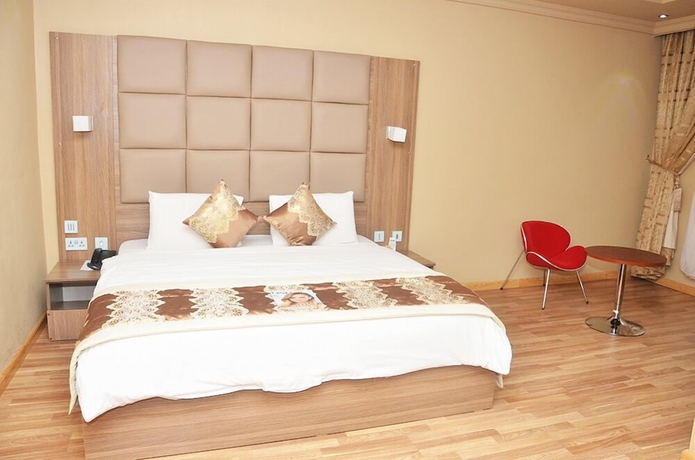 Imagen de la habitación del Hotel Blue Ribbon Suites. Foto 11