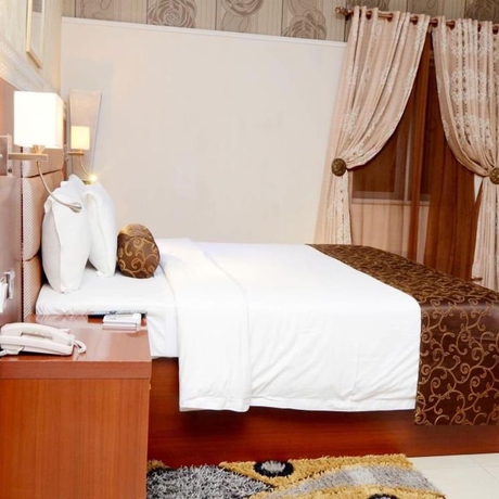 Imagen de la habitación del Hotel Blue Ribbon Suites. Foto 13