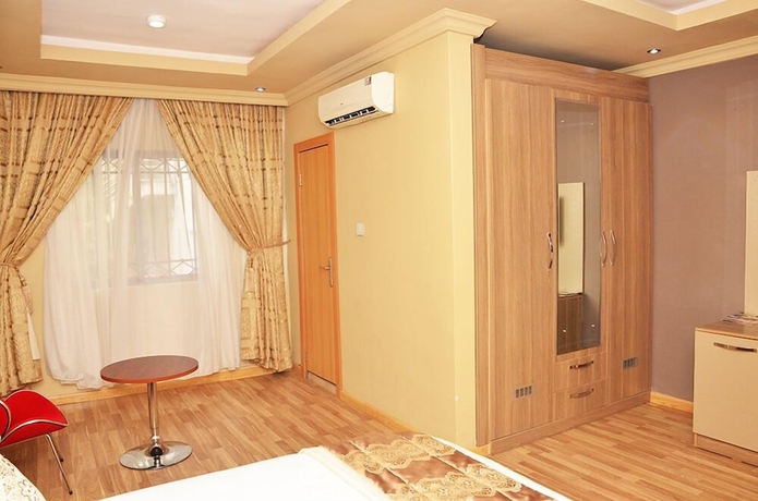 Imagen de la habitación del Hotel Blue Ribbon Suites. Foto 16