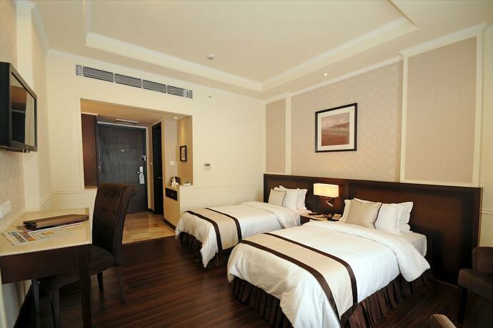 Imagen de la habitación del Hotel Blue Saphire Clarks Inn Haldwani. Foto 15