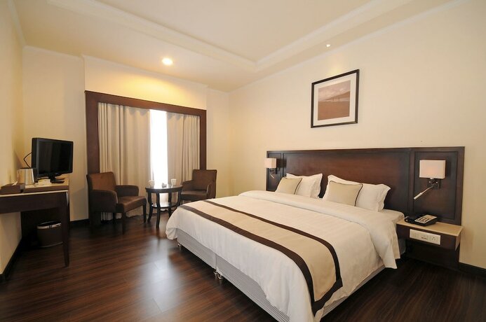Imagen de la habitación del Hotel Blue Saphire Clarks Inn Haldwani. Foto 16