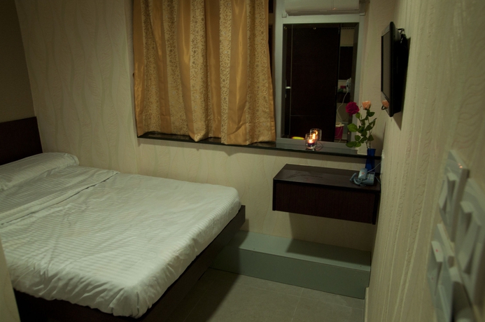 Imagen de la habitación del Hotel Blue Sky, Mong Kok. Foto 6
