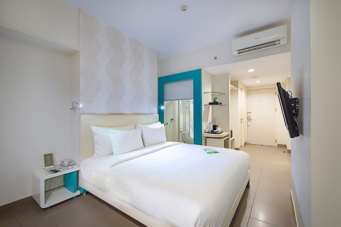 Imagen de la habitación del Hotel Blue Sky Petamburan. Foto 8