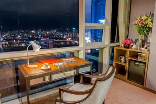 Imagen de la habitación del Hotel Blue Sky and Tower. Foto 5