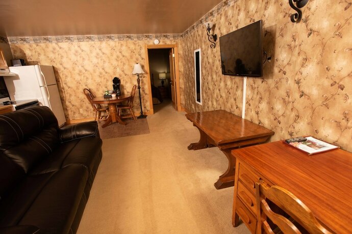Imagen de la habitación del Hotel Blue Spruce Motel. Foto 15